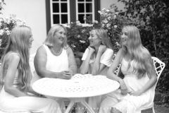 Black and white natural portrait of family bond between mother and daughters CFP1057-1M
